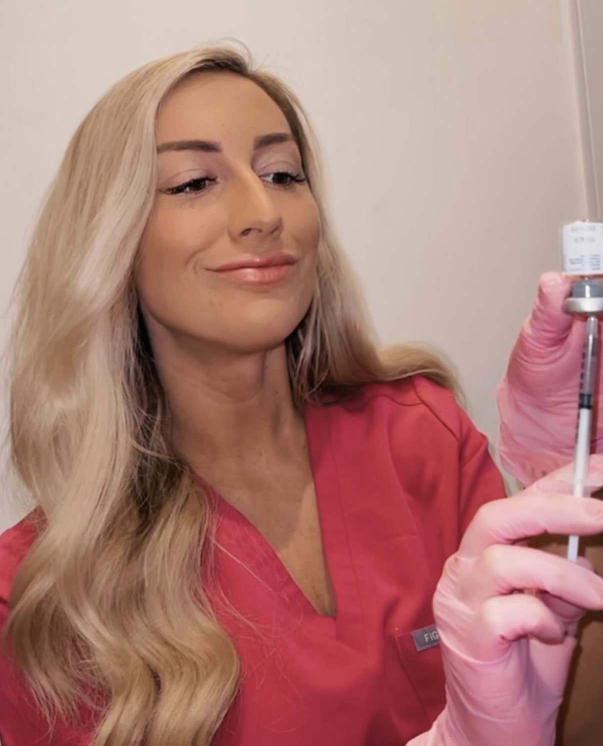IV League nurse injector drawing up Botox in South Boston