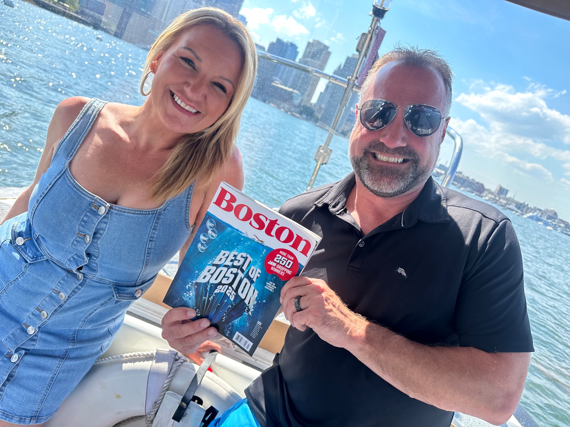 IV League Hydration founders with the Best of Boston 2025 issue on Boston Harbor